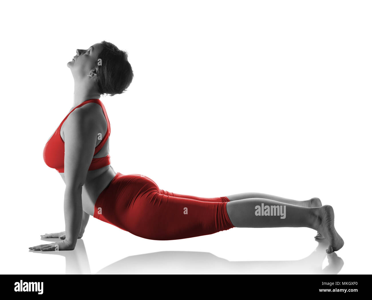 Frau cobra tun Pose auf Weiß Stockfoto