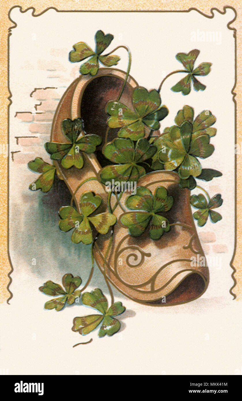 Klee und Holzschuh Stockfoto