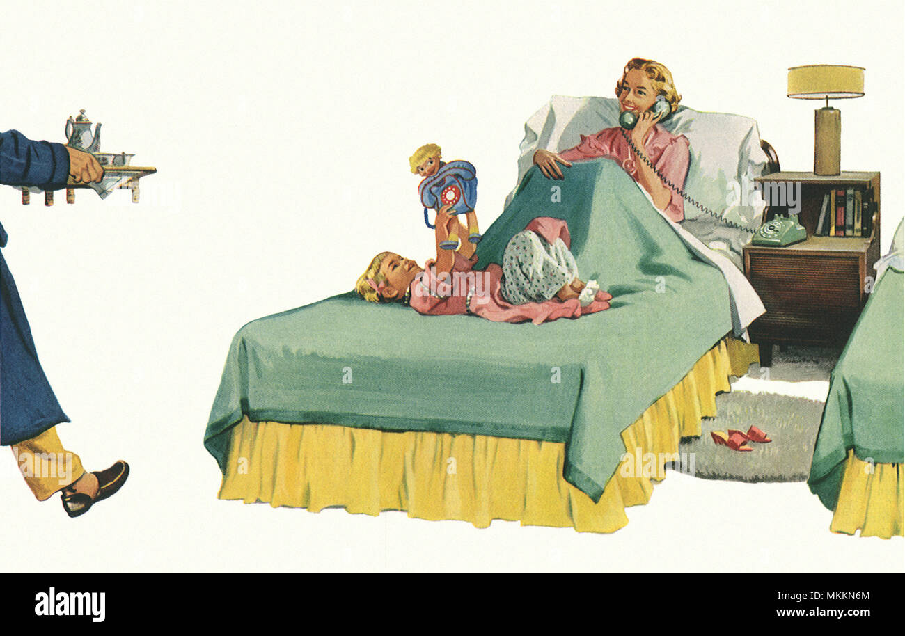 Mutter und Vater im Bett, Kaffee Stockfoto