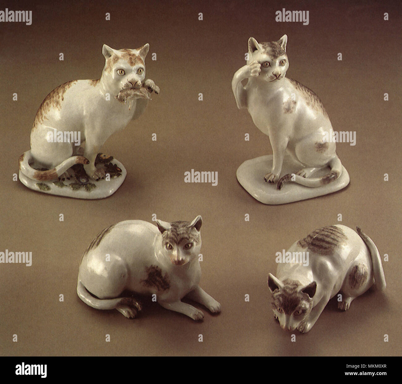 Vier Porzellan Katzen Stockfoto