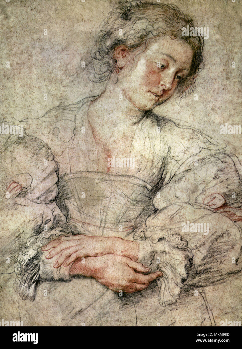 Frau mit gekreuzten Händen Stockfoto