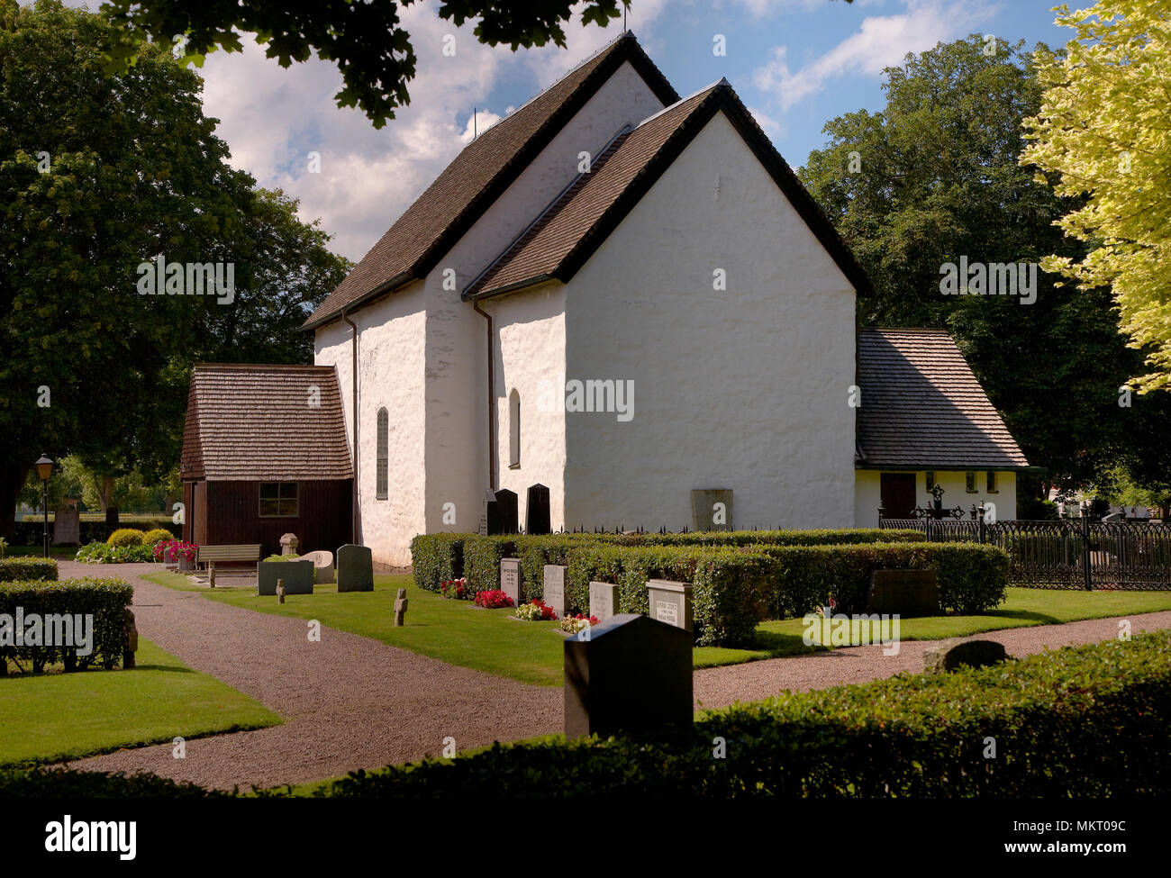 Götene Kirche in Schweden wurde in den 1100iger Jahren gebaut wurde und heute als Kirche in der Diözese Skara und Götene Pfarrei verwendet. Stockfoto