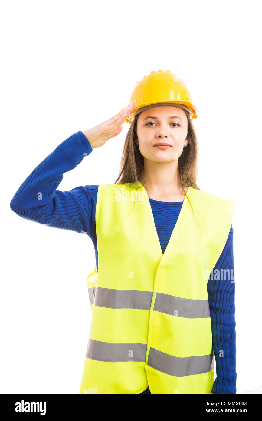 Junge weibliche Architekt oder Ingenieur Arbeiter die Armee salute wie respektvollen Disziplinierte Haltung Konzept auf weißem Hintergrund Stockfoto