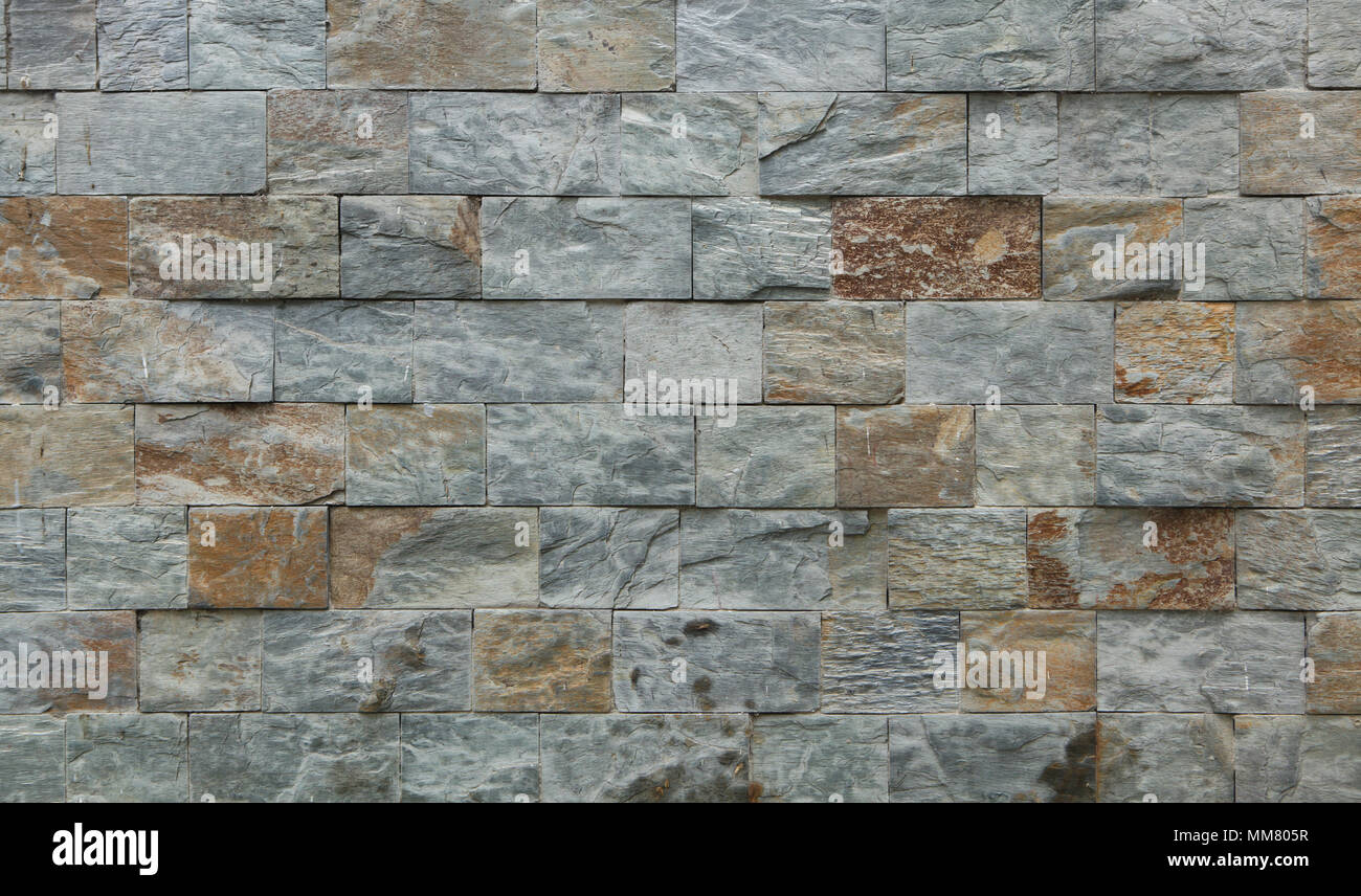 Fassade aus Stein Fliesen. Hintergrund Textur. Stockfoto