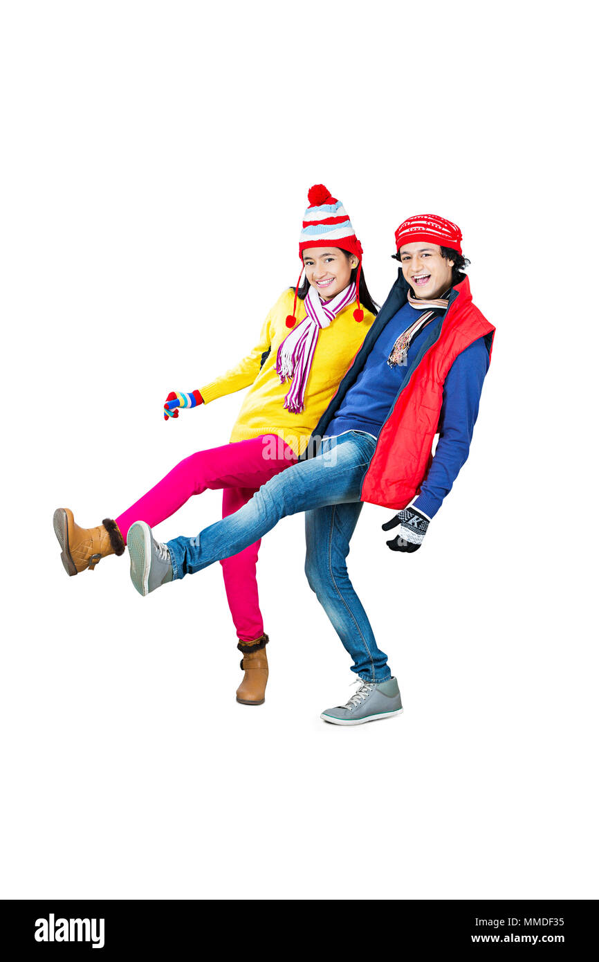 Glückliche zwei jungen Freund Stehen-auf-einem-Bein-Spaß fröhlich in der Wintersaison Stockfoto