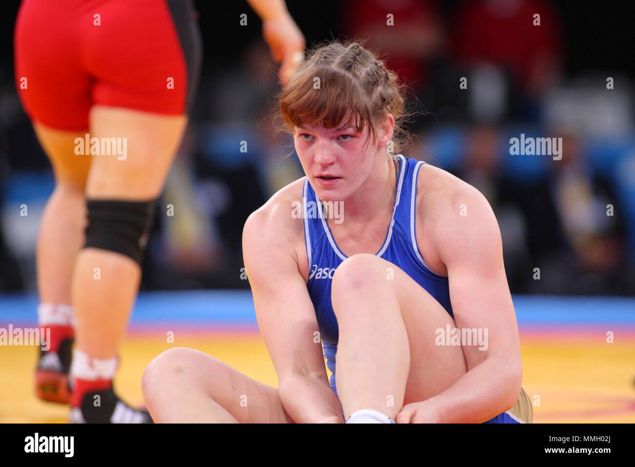 Zlateva Stanka vs Ekaterina Bukina bei den Frauen Greco Roman Wrestling, FILA Wettbewerb Programm, Excel Arena, London, 11. Dezember 2011 Wettbewerb Stockfoto