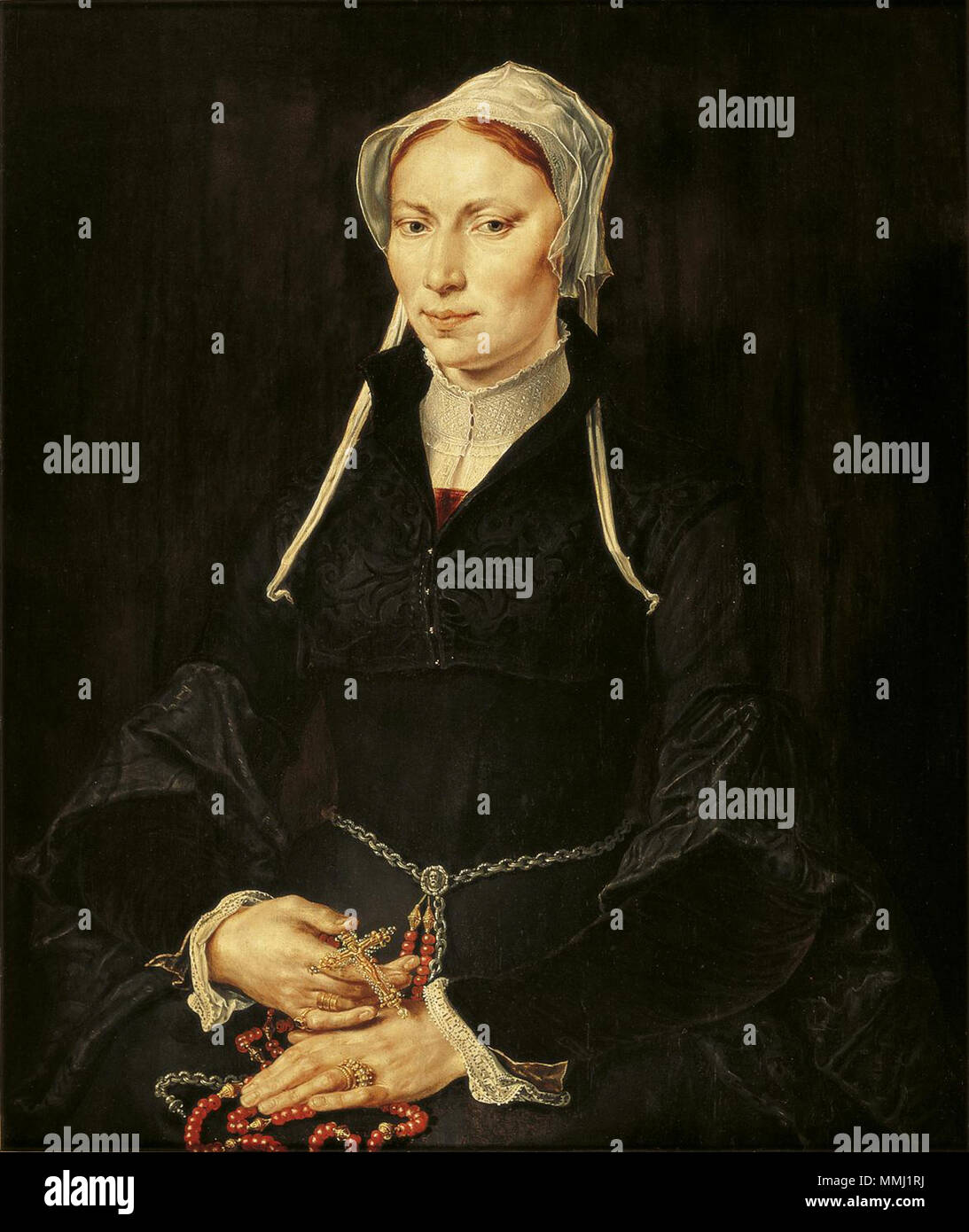 . Englisch: Malerei der Nonne Hillegond Gerritsdr, die eine Nonne im St. Anna Kloster von Haarlem wurde ca 1530. Sie war vermutlich Marten van Heemskerck's Sister-in-law. Sie war eine wohlhabende Katholische und ist mit einem rosenkranz dargestellt. Als sie starb, werden Sie alle Ihre Besitzungen, einschließlich dieser Malerei, die Hofje van Codde und Beresteyn, wo es seit Jahrhunderten in das Regent's Zimmer aufgehängt. Jetzt auf Darlehen an dem Frans Hals Museum in Haarlem. Porträt einer Frau. ca. 1530. Hillegond gerritsdr - Marten van Heemskerck Stockfoto