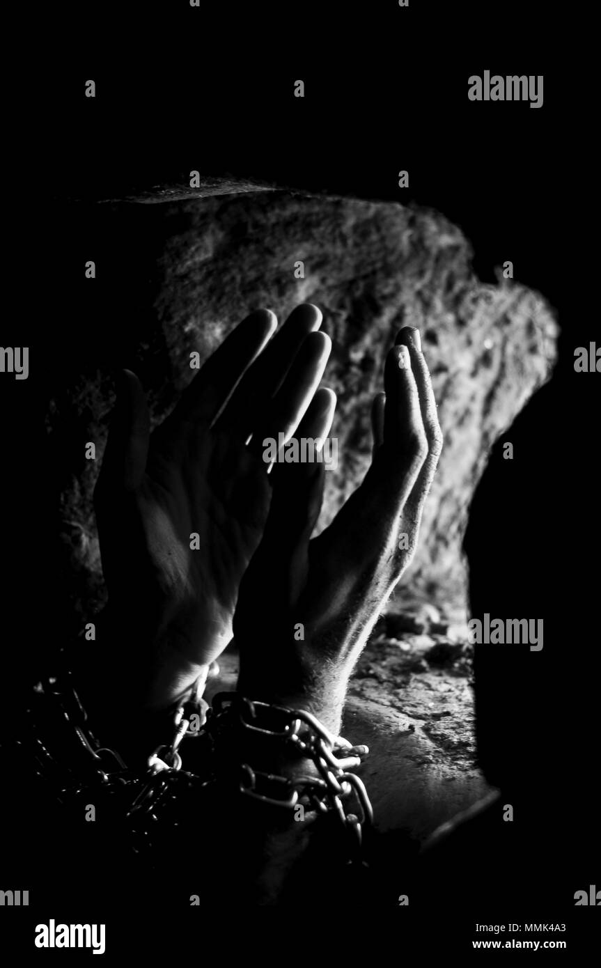 Beten Gefangener Stockfoto