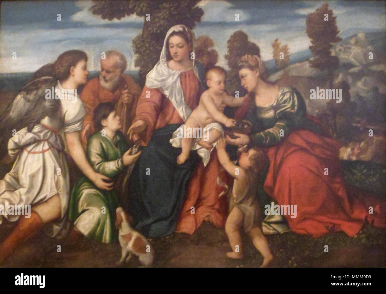 Bonifacio Veronese - Sacra Conversación o Sagrada Familia con Tobias y El Angel, y los santos Dorotea, Giovannino, Juan Bautista Niño y detrás El Milagro del Campo de trigo - 1550 Stockfoto