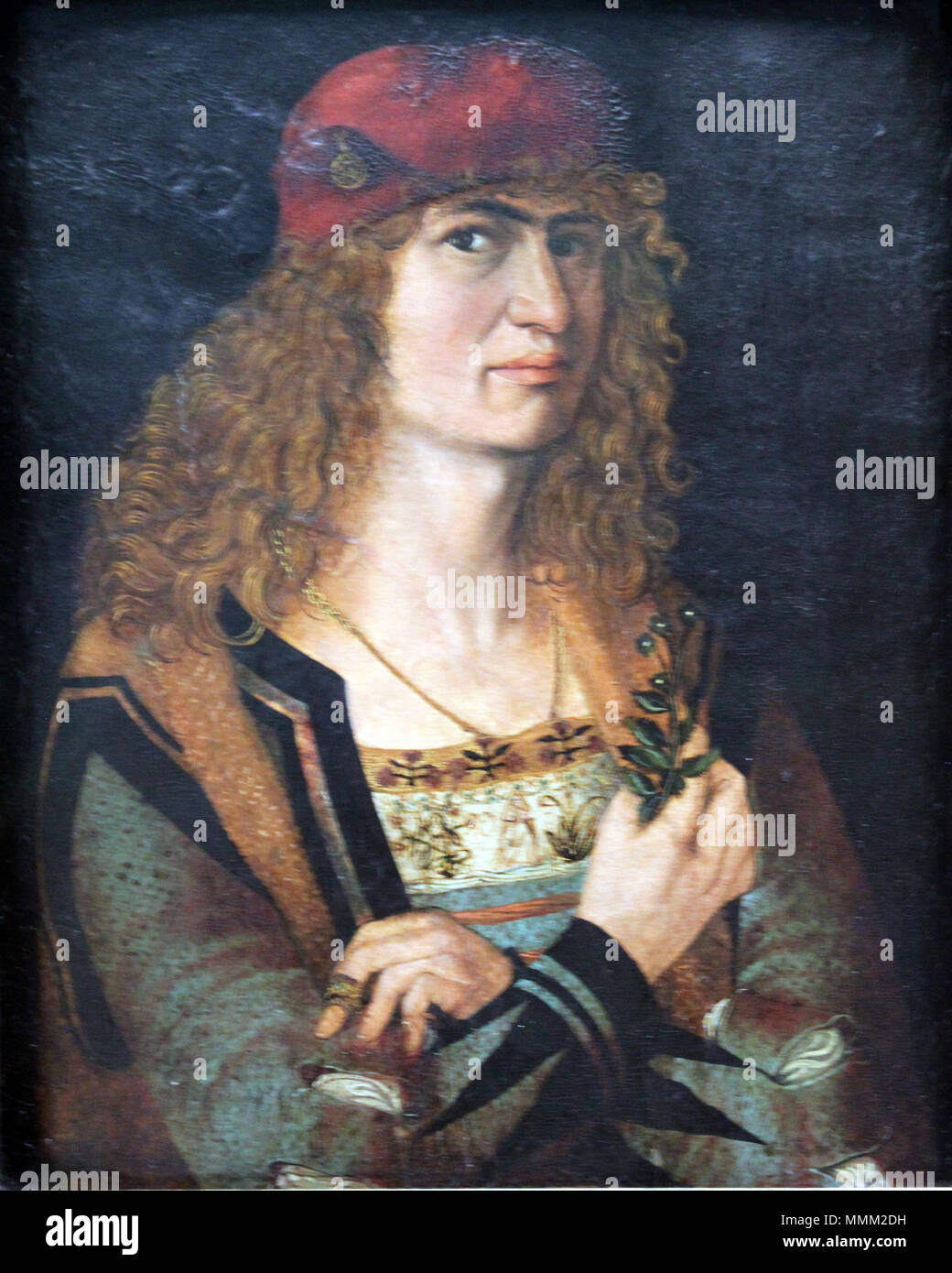 . English: Der aufwendig gekleidete Bräutigam hält in der rechten Hand ein Sträußchen Vergissmeinnicht. Blick und Haltung zeigen den Einfluss von Madrider Dürers Selbstbildnis von 1498 deutschen: Bildnis eines Bräutigams Porträt eines Bräutigams. ca. 1498. 1498 Elsner Bildnis des Braeutigams anagoria Stockfoto