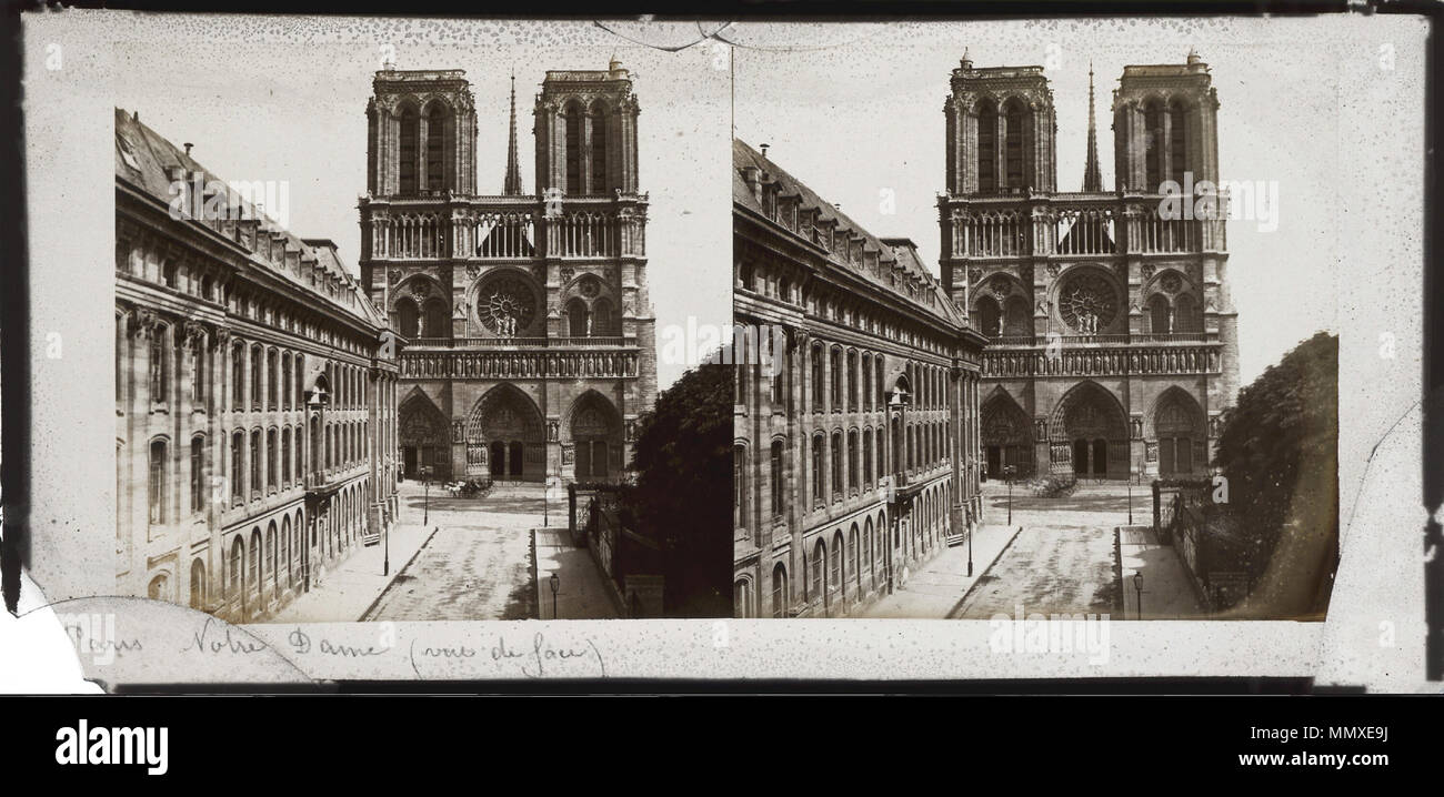 . Français: Hôpital des Enfants trouvés (à Gauche) et Fassade de la Cathédrale Notre-Dame de Paris, vue de la rue Neuve-Notre-Dame, disparue en 1865 en prévision de l'Agrandissement du parvis Notre-Dame entrepris par le Baron Haussmann. Englisch: Fassade von Notre-Dame de Paris. Vor 1865. Unbekannt der Fassade von Notre-Dame de Paris. Stockfoto