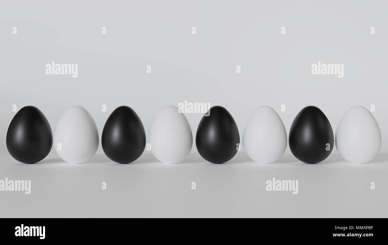 Die Eier sind weiß und schwarz. In einer Zeile positioniert. Stockfoto