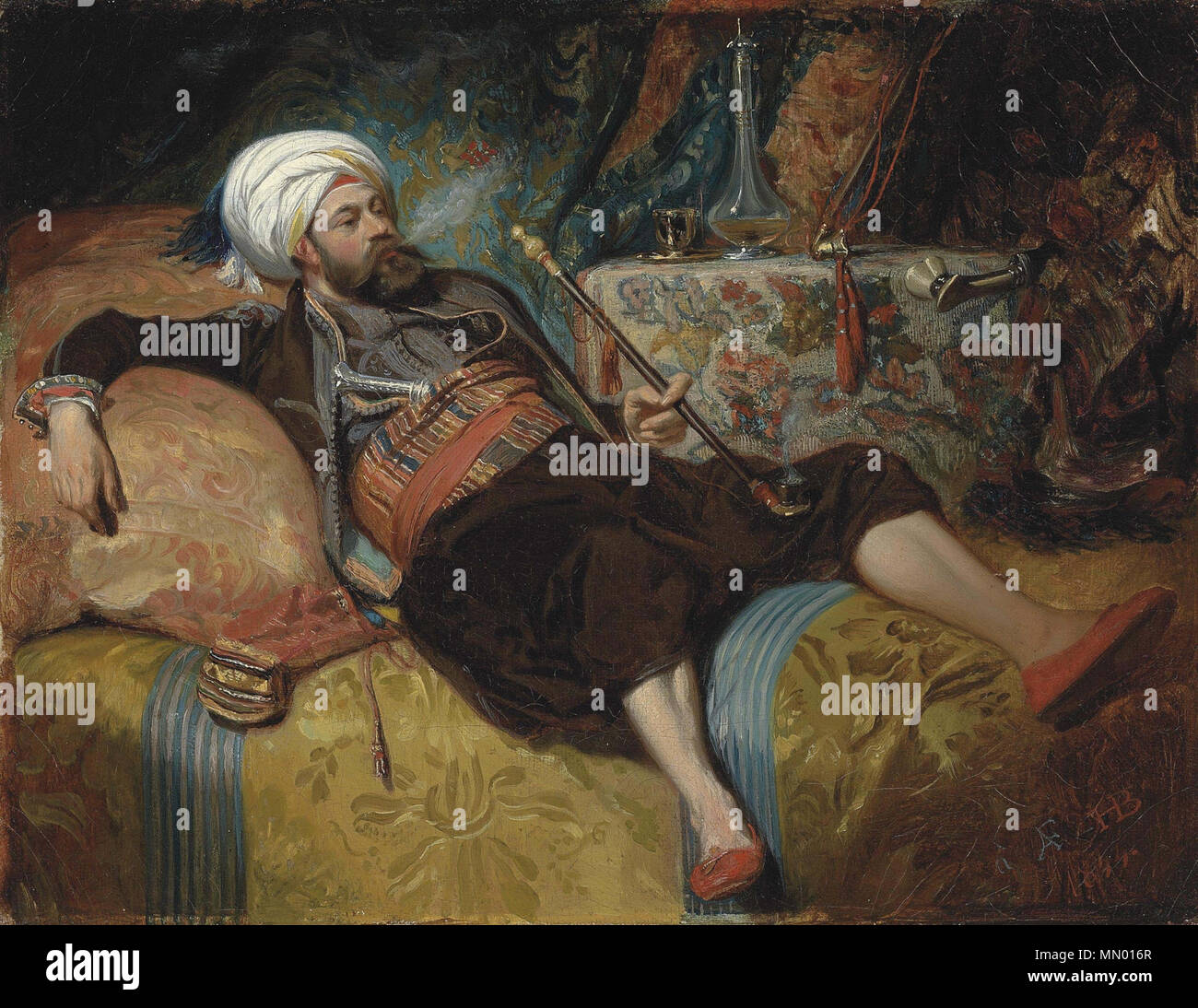 Henri Charles Antoine Baron-Un-Turc fume couché (1844). Stockfoto