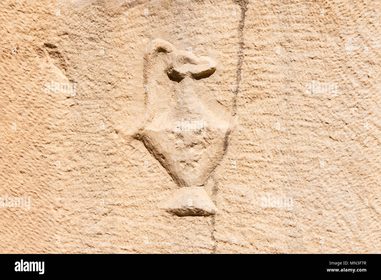 Stein Kunst in den Ruinen des antiken Römischen Amphitheater Stockfoto