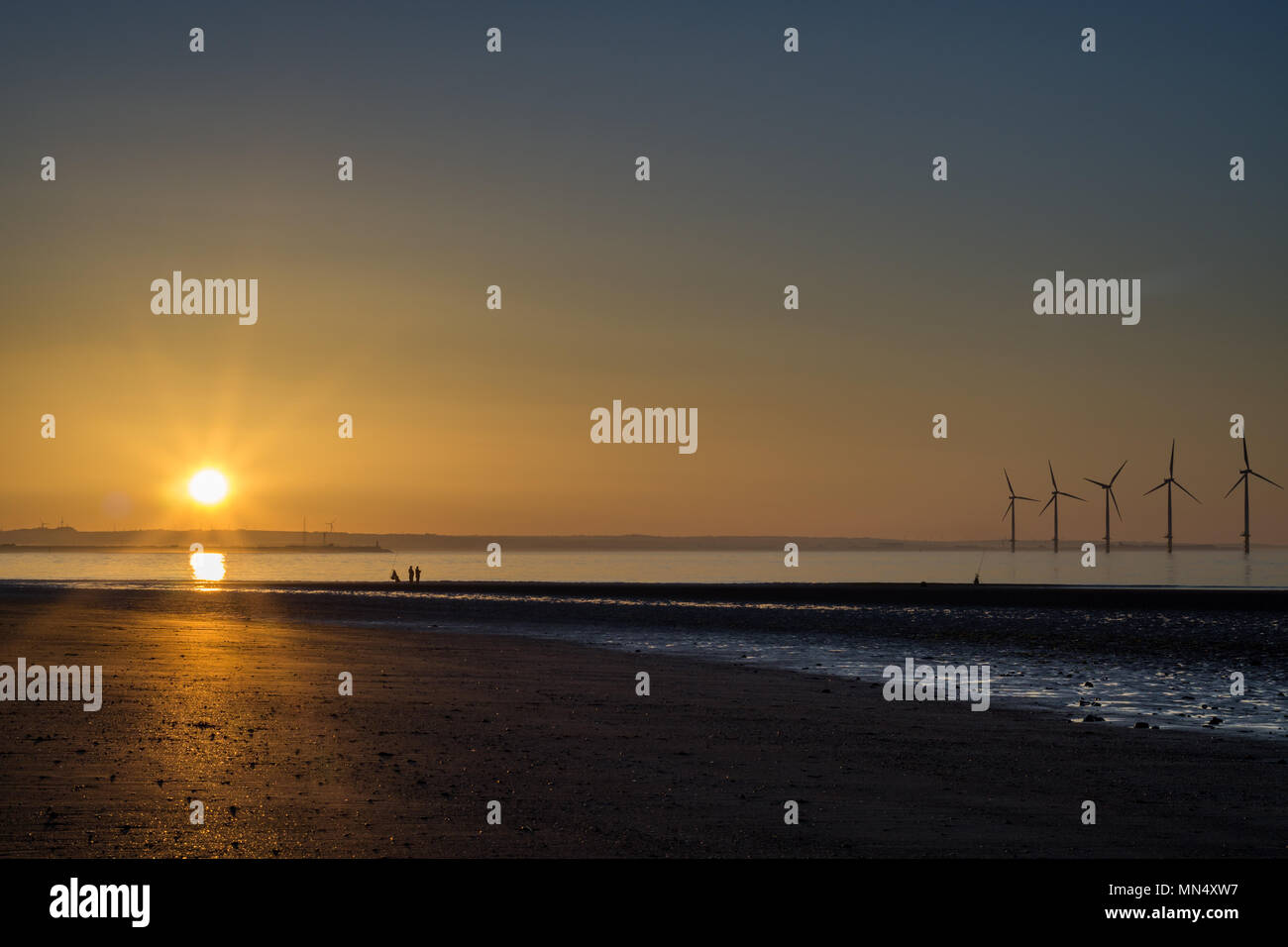 Redcar Strand Sonnenuntergang. Stockfoto