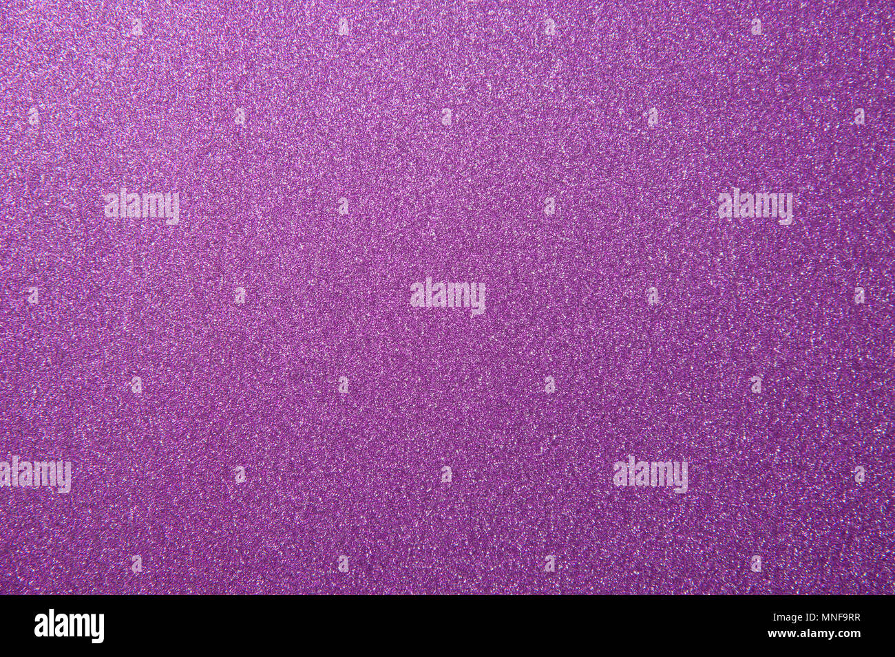 Textur von Purple glitter Papier Hintergrund für Design Weihnachten oder Neujahr Karten Stockfoto