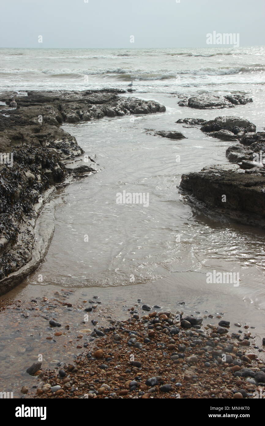 Am Strand bei Ebbe - Bexhill-on-Sea, Sussex Stockfoto