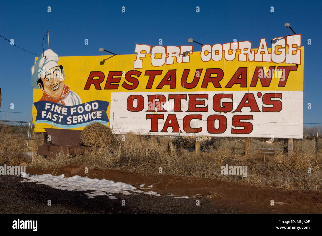 Am Straßenrand handbemalte Plakatwand in New Mexico Stockfoto