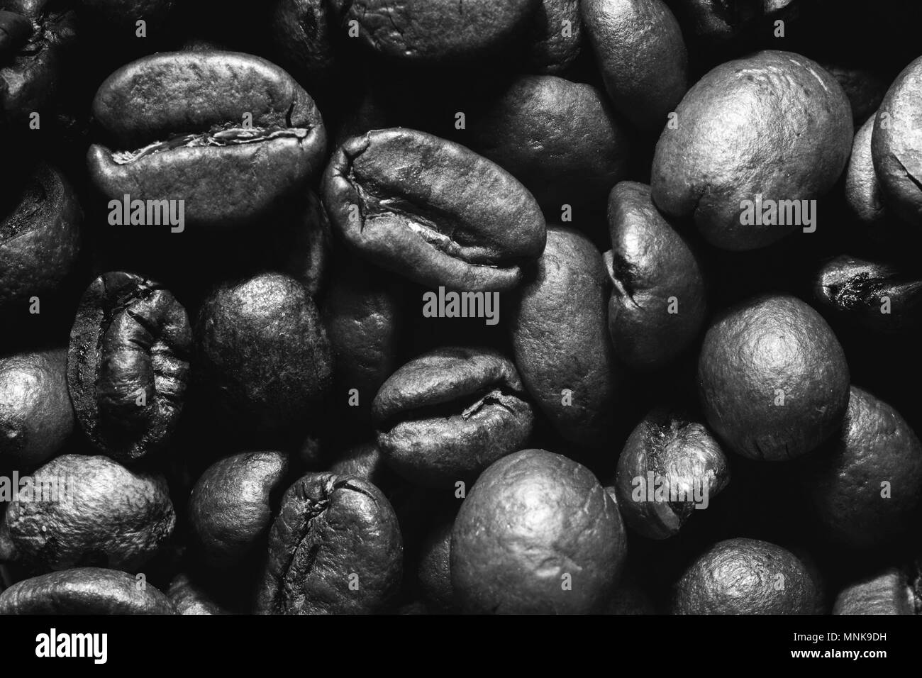 Geröstete Kaffeebohnen close-up. Leckeres Aroma wallpaper Stockfoto