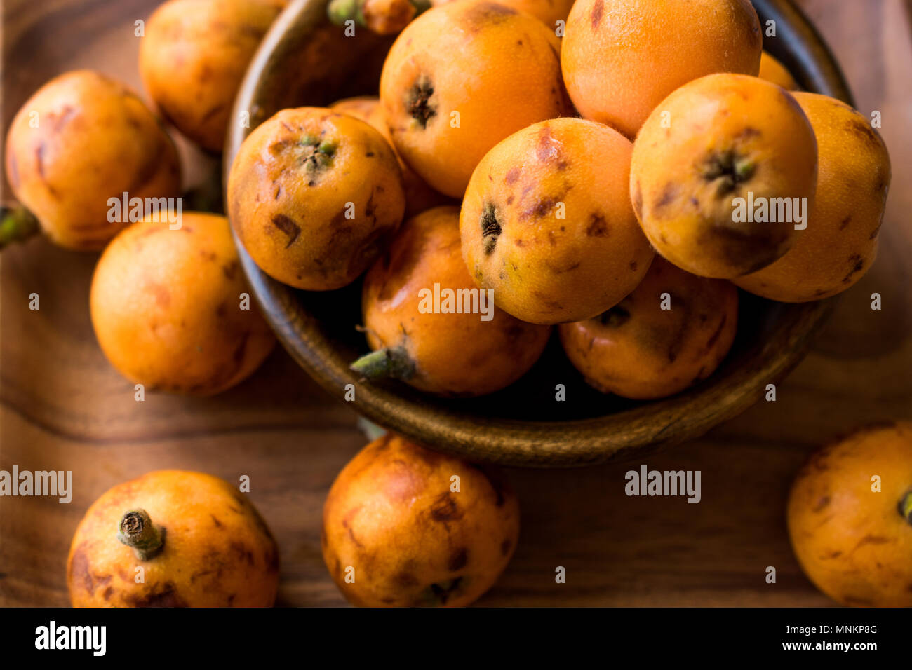 Mispel Pflaume Obst/Eirobotrya Japonica bereit zu essen. Ökologische Lebensmittel. Stockfoto