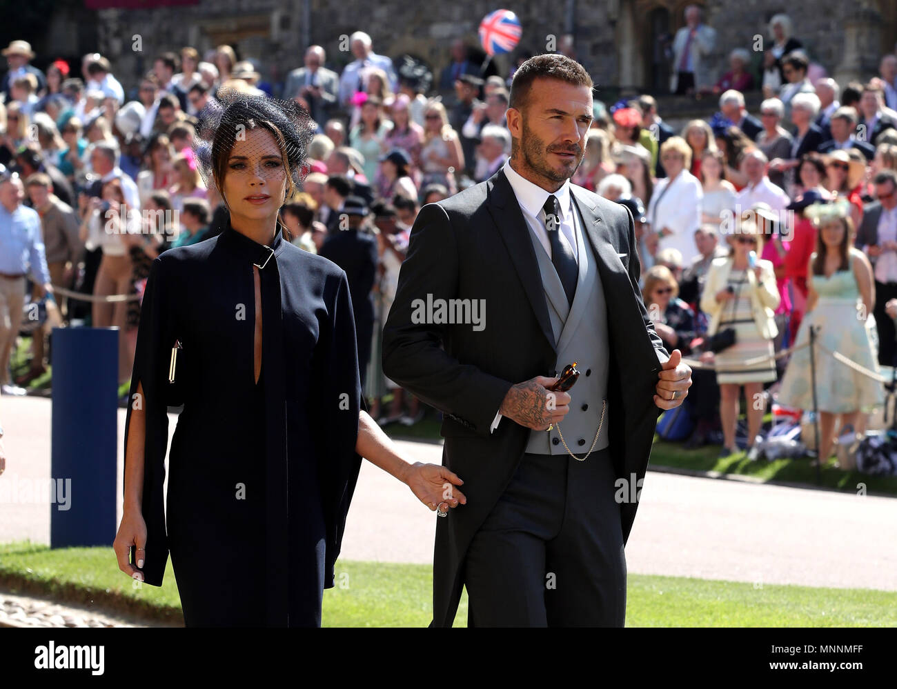 David und Victoria Beckham Ankunft in der St. George's Chapel auf Schloss Windsor für die Hochzeit von Meghan Markle und Prinz Harry. Stockfoto