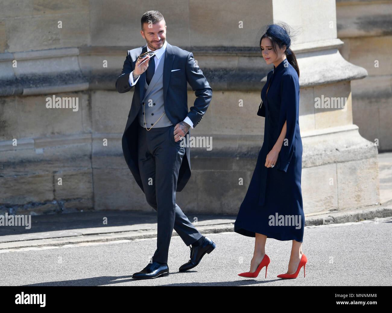 David und Victoria Beckham Ankunft in der St. George's Chapel in Windsor Castle für die Hochzeit von Prinz Harry und Meghan Markle. Stockfoto