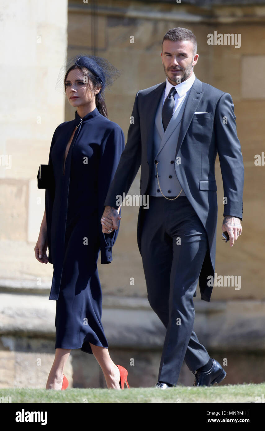 David und Victoria Beckham Ankunft in der St. George's Chapel auf Schloss Windsor für die Hochzeit von Meghan Markle und Prinz Harry. Stockfoto