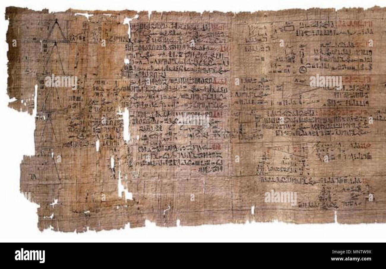 . Mathematische Papyrus Rhind: Detail (recto, linke Teil der erste Abschnitt British Museum, EA10057) Theben, Ende der Zweiten Zwischenzeit (ca. 1550 v. Chr.) von der schottischen Anwalt A.H. Rhind während seines Aufenthalts in Theben in der 1850 erworbenen s. Länge: 295,5 cm, Breite: 32 cm (gesamte Abschnitt EA10057) British Museum Abteilung des Alten Ägypten und Sudan Http://www.britishmuseum.org/research/collection online/Sammlung objekt details.aspx?objectId=117389&partId=1 Der zweite Abschnitt ist im British Museum (EA10058 Länge: 199.5 cm, gleiche Breite) Fragmente einer kleinen Zwischenstück (18 C aufbewahrt Stockfoto