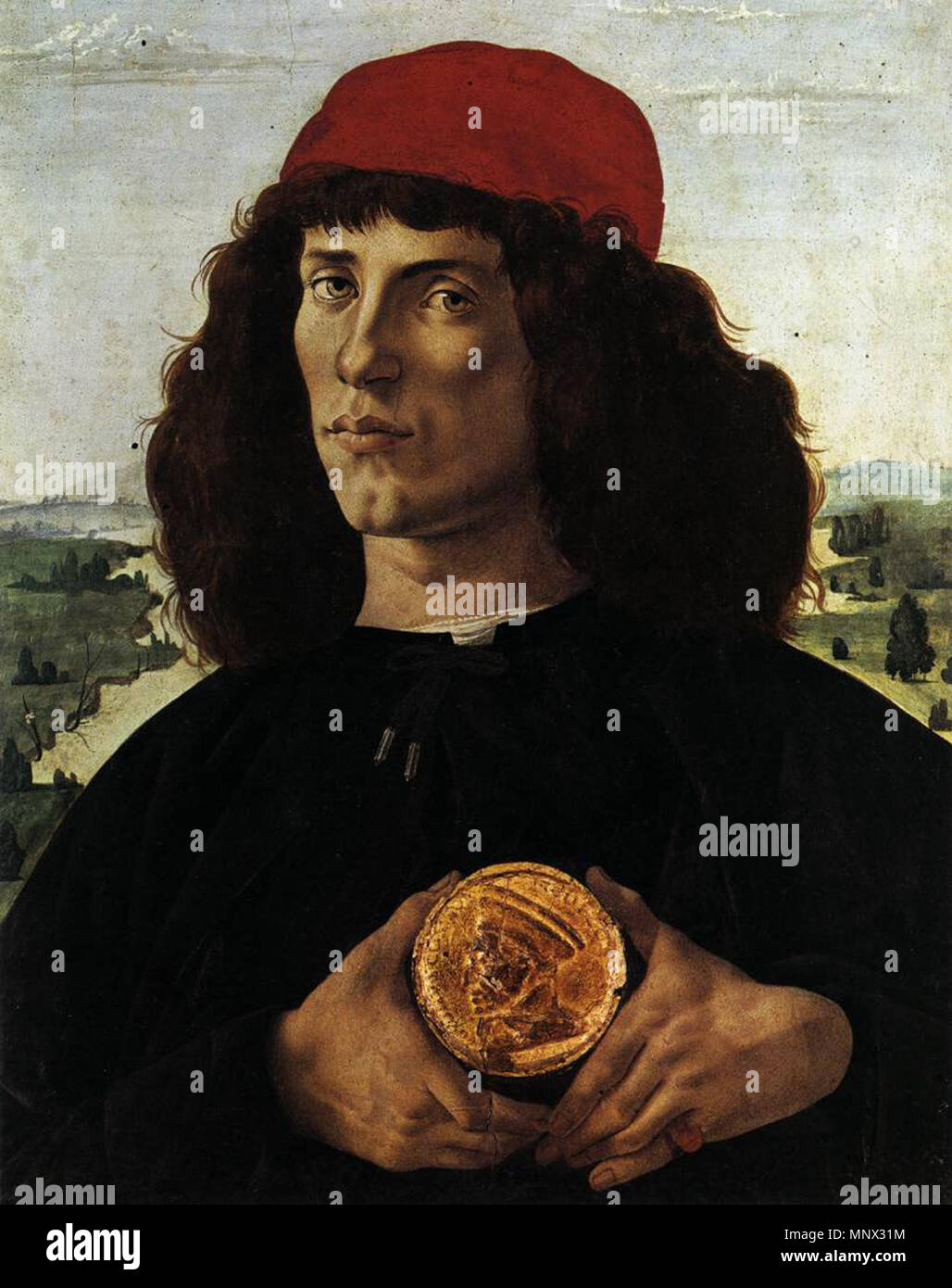 Porträt eines Mannes mit einer Medaille von Cosimo den Älteren ca. 1474. 1093 Sandro Botticelli - Bildnis eines Mannes mit einer Medaille von Cosimo den Älteren - WGA 2792 Stockfoto