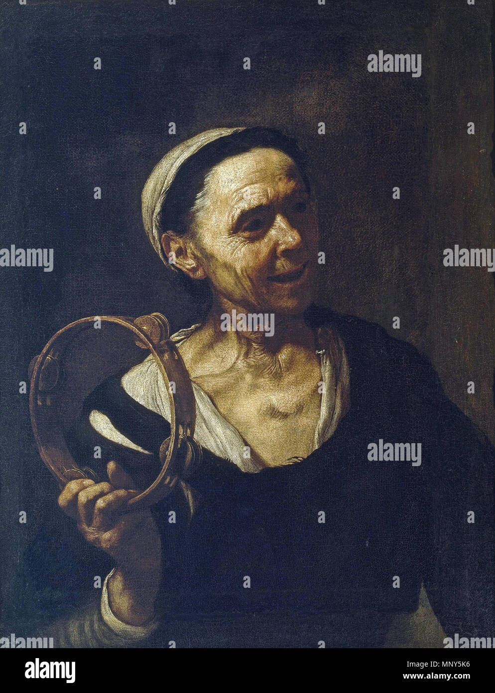 Vieja con una sonaja. Español: La Obra Vertreter a Una Mujer con una sonaja anciana. . 17. Jahrhundert. 1233 Vieja con una sonaja, De Esteban März (Museo del Prado) Stockfoto