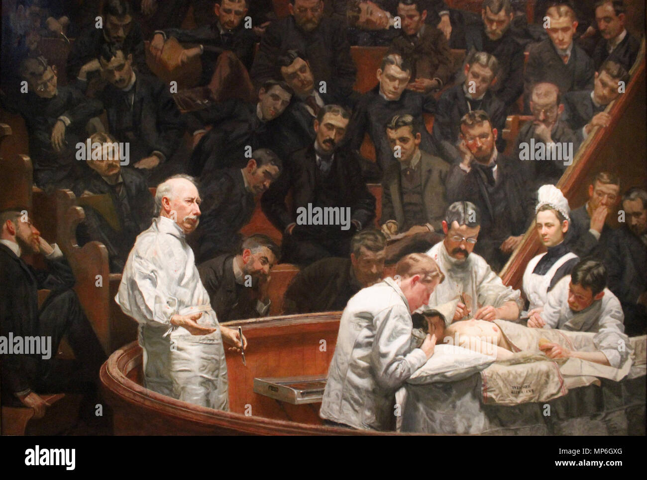 Die Agnew Klinik. 1889, Studenten von der Universität von Pennsylvania Schule von Medizin in Auftrag Eakins ein Porträt des scheidenden Professor der Chirurgie Dr. D. Hayes Agnew zu machen. Tag und Nacht arbeiten, Eakins abgeschlossen die Malerei in drei Monaten, in der Zeit, für die es an der Universität Beginn am 1. Mai 1889 vorgelegt werden soll. 1889. 1168 Agnew Klinik - Thomas Eakins Stockfoto