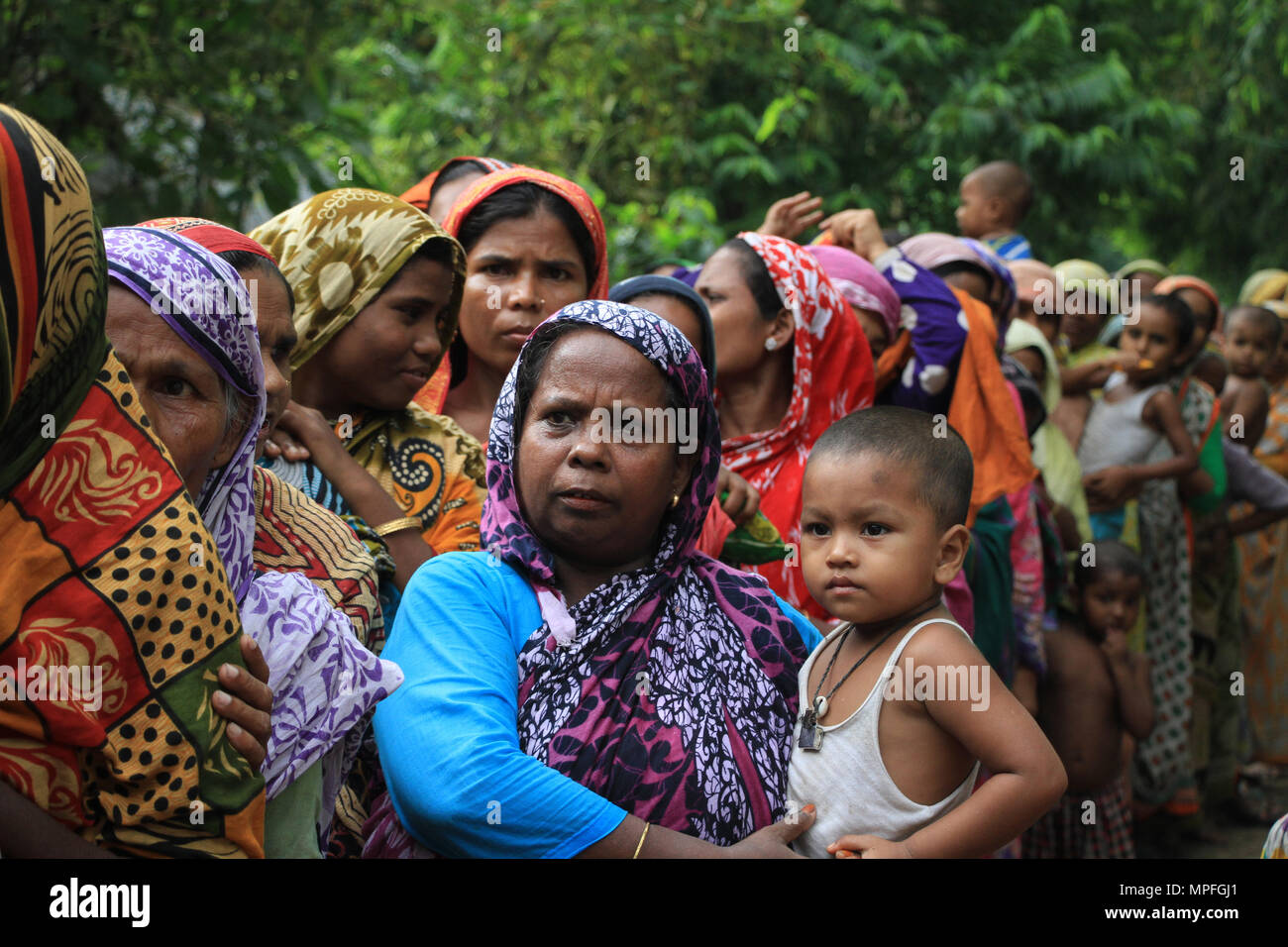 Bangladesch. Flut betroffenen Menschen in Bangladesch. Bangladesch hat jedes Jahr Hochwasser aufgrund der verheerenden Monsunregen, Flash-Flut und Anstieg der weltweiten Temperatur wie die Schmelzwasser aus dem Himalaya gelitten. Millionen Menschen sind betroffen und viele während der Flut in diesem Land getötet. Menschen leiden unter Nahrungsmittelknappheit, reines Trinkwasser, Krankheiten und viele von ihnen den Verlust ihrer Häuser, Vieh, Getreide und Sie gehen durch die katastrophale Situation während und nach dem Hochwasser. © REHMAN Asad/Alamy Stock Foto Stockfoto