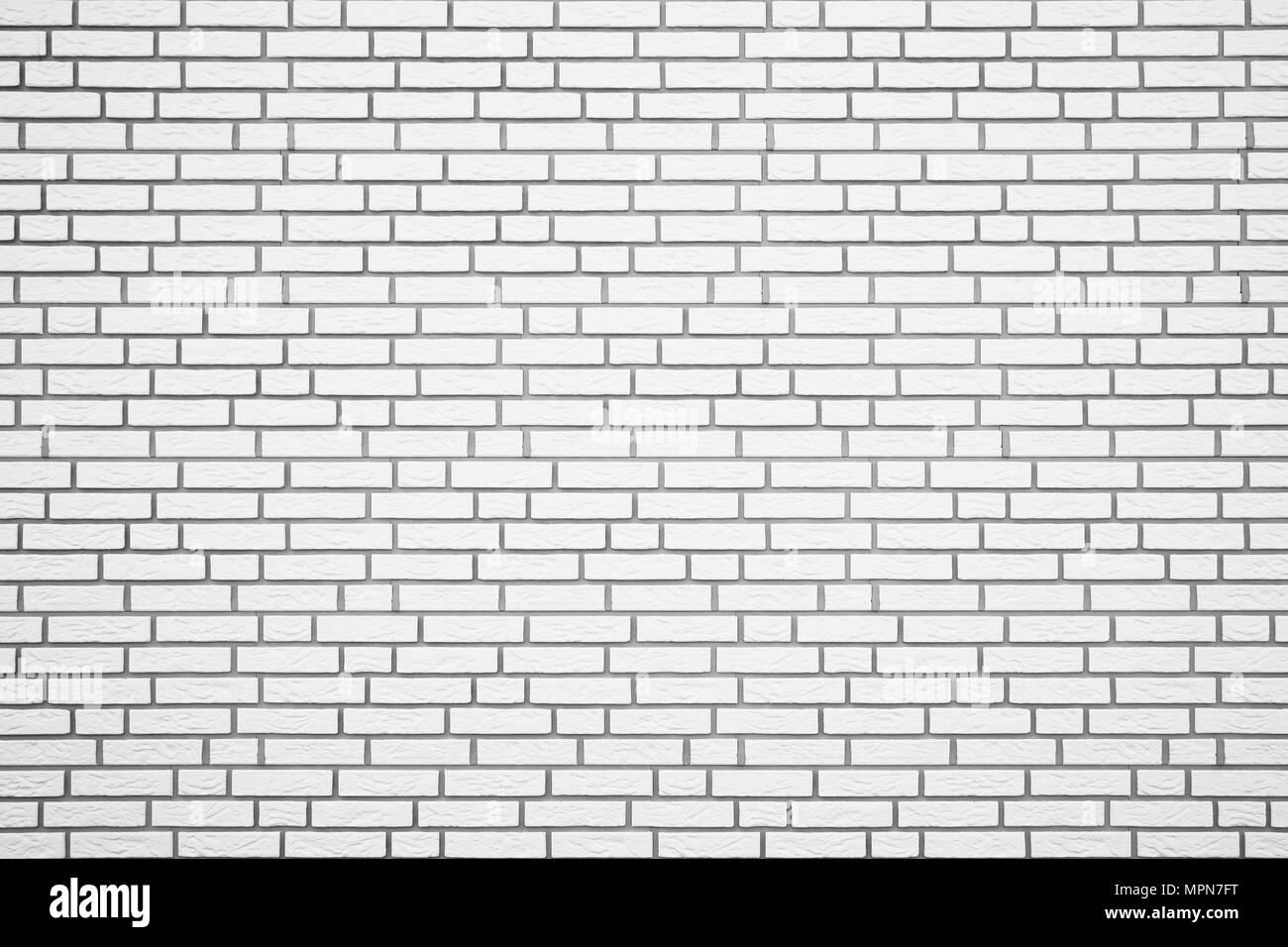Weiße Mauer mit grauen Fugen Hintergrund Textur muster Stockfoto