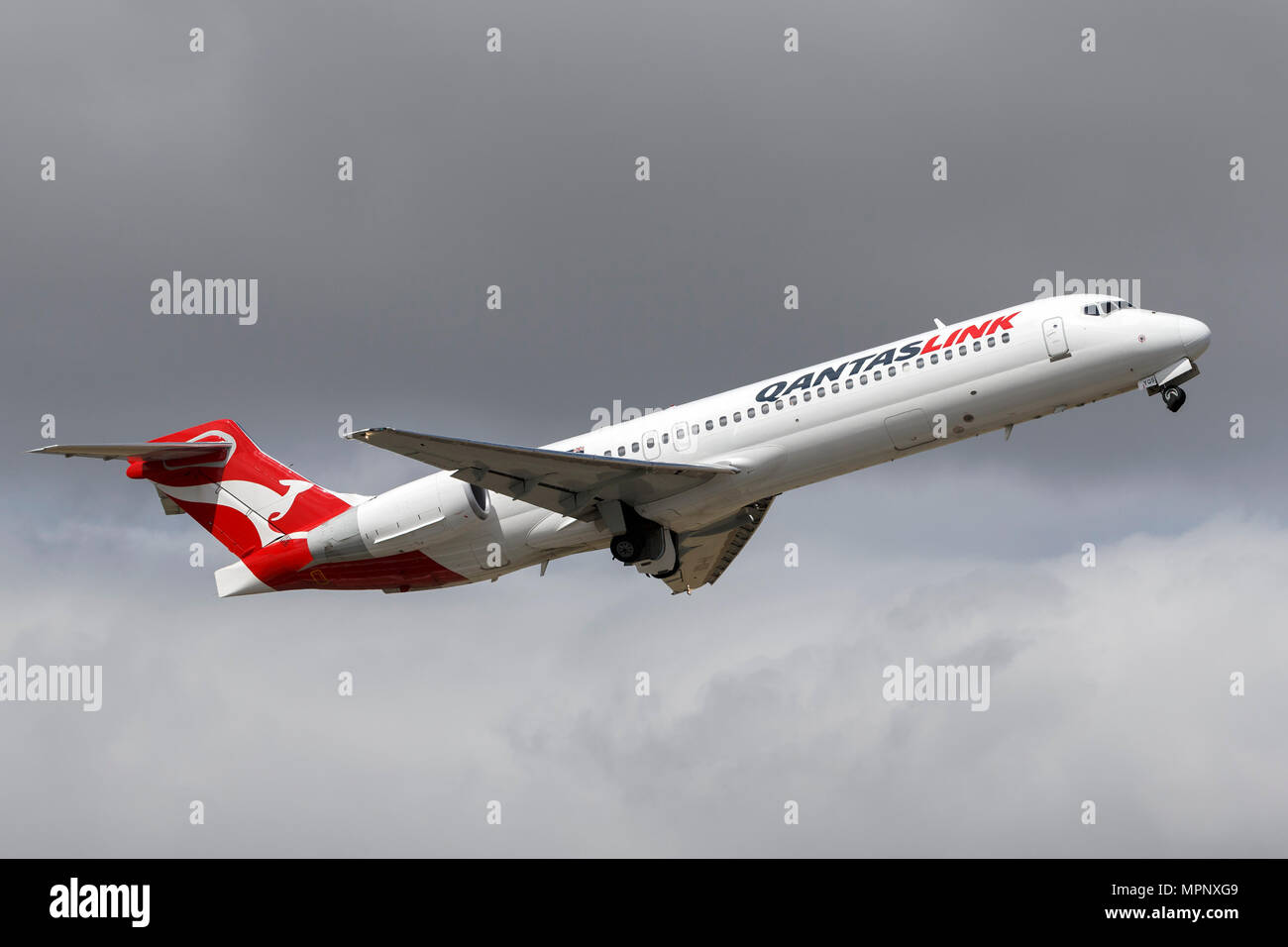 QantasLink Boeing 717 Airliner VH - YQS Abfahrt Melbourne International Airport. Stockfoto