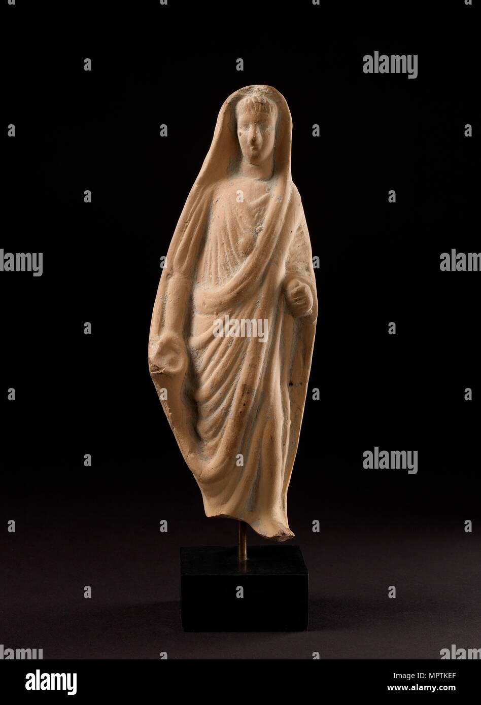 Terrakotta Statuette eines frommen Roman sein Haupt verhüllen mit seiner Toga, 1. Jahrhundert. Artist: Unbekannt. Stockfoto