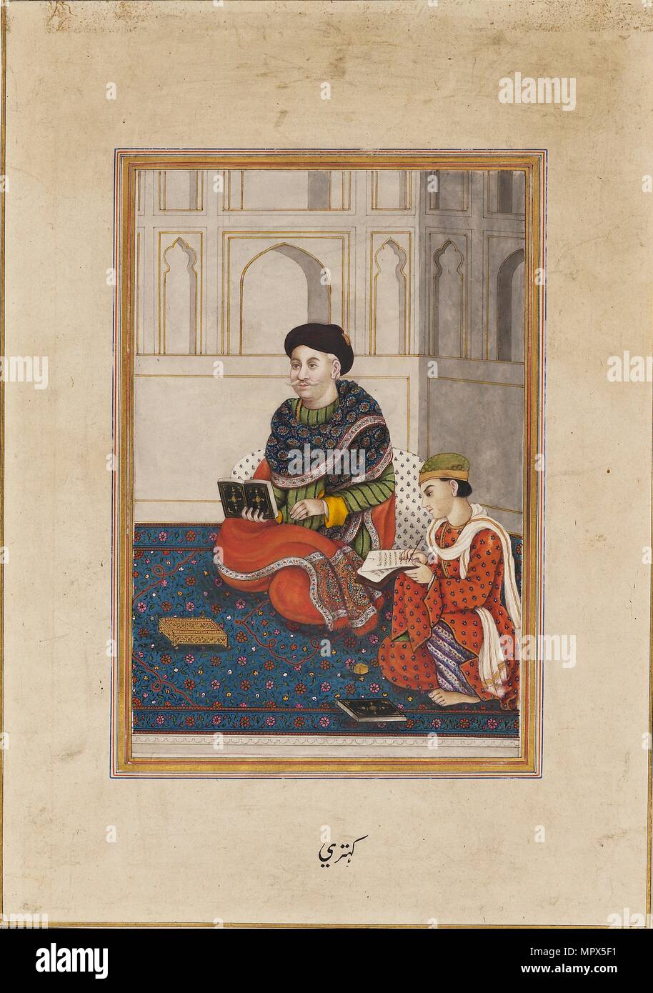 Mann, vielleicht ein Mullah, Lesen mit einem Schreiber, 19. Artist: Unbekannt. Stockfoto