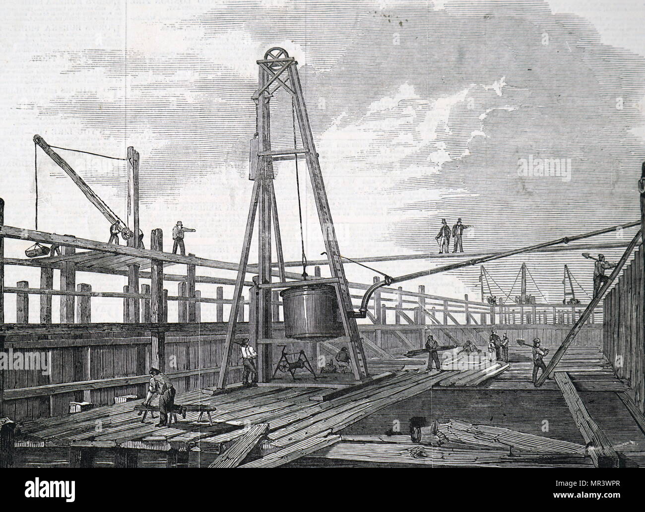 Abbildung: Darstellung Clarke & Varley's atmosphärischer Rammen Maschine. Eine Dampfmaschine wurde verwendet, um die Luft aus dem Zylinder zu Pumpen, mit dem Ergebnis, dass der atmosphärische Druck den Kolben nach unten gedrückt. Die Abwärtsbewegung des Kolbens hob das Gewicht für Sie bereit. Vom 19. Jahrhundert Stockfoto