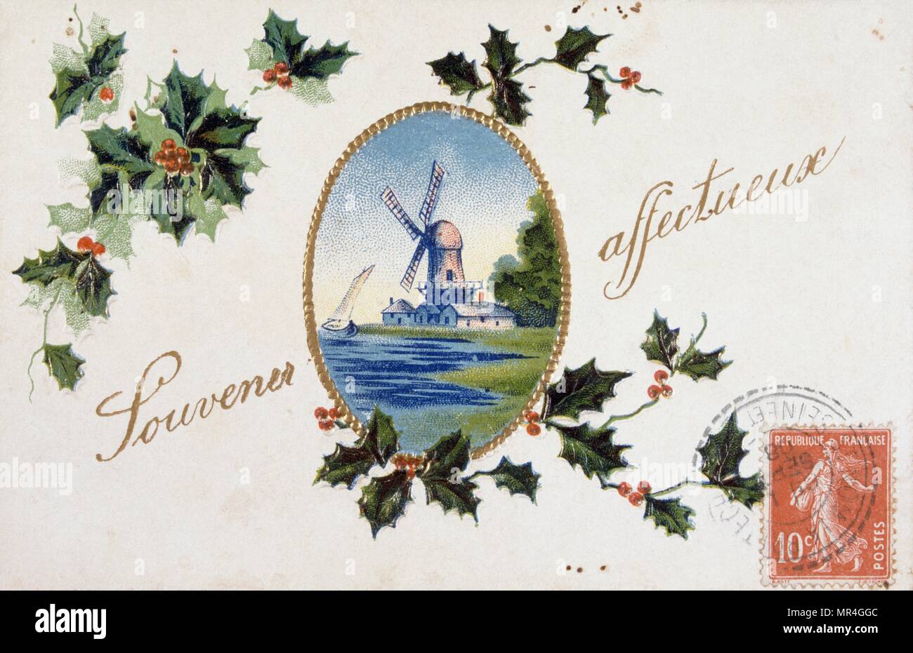 Französische Grußkarte mit Mühle und Holly dekorative Elemente 1900 Stockfoto