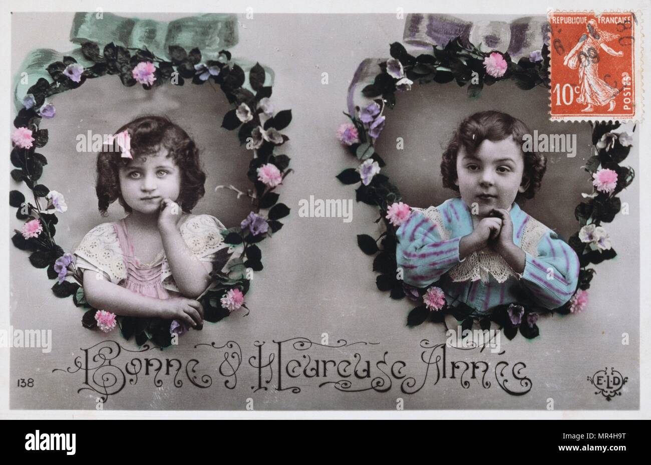 Französische neues Jahr Postkarte mit zwei jungen Mädchen 1900 Stockfoto