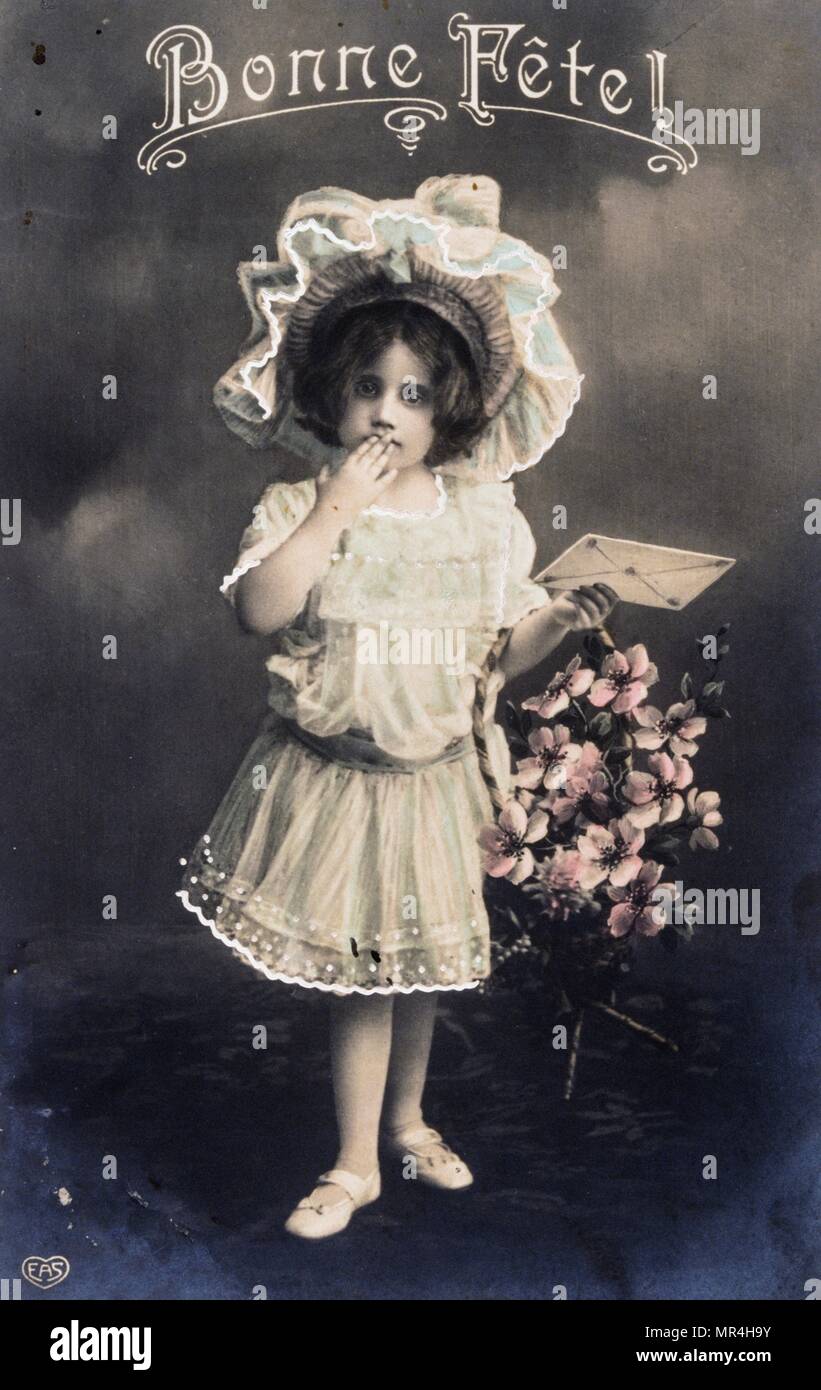 Französische neues Jahr Postkarte, ein junges Mädchen mit einem Korb mit Blumen 1900 Stockfoto