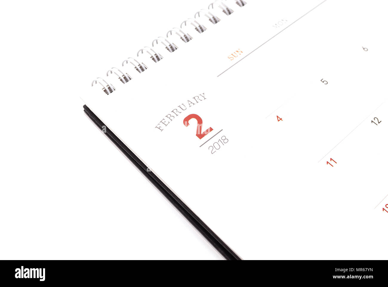 Schreibtisch Kalender auf weißem Hintergrund Stockfoto