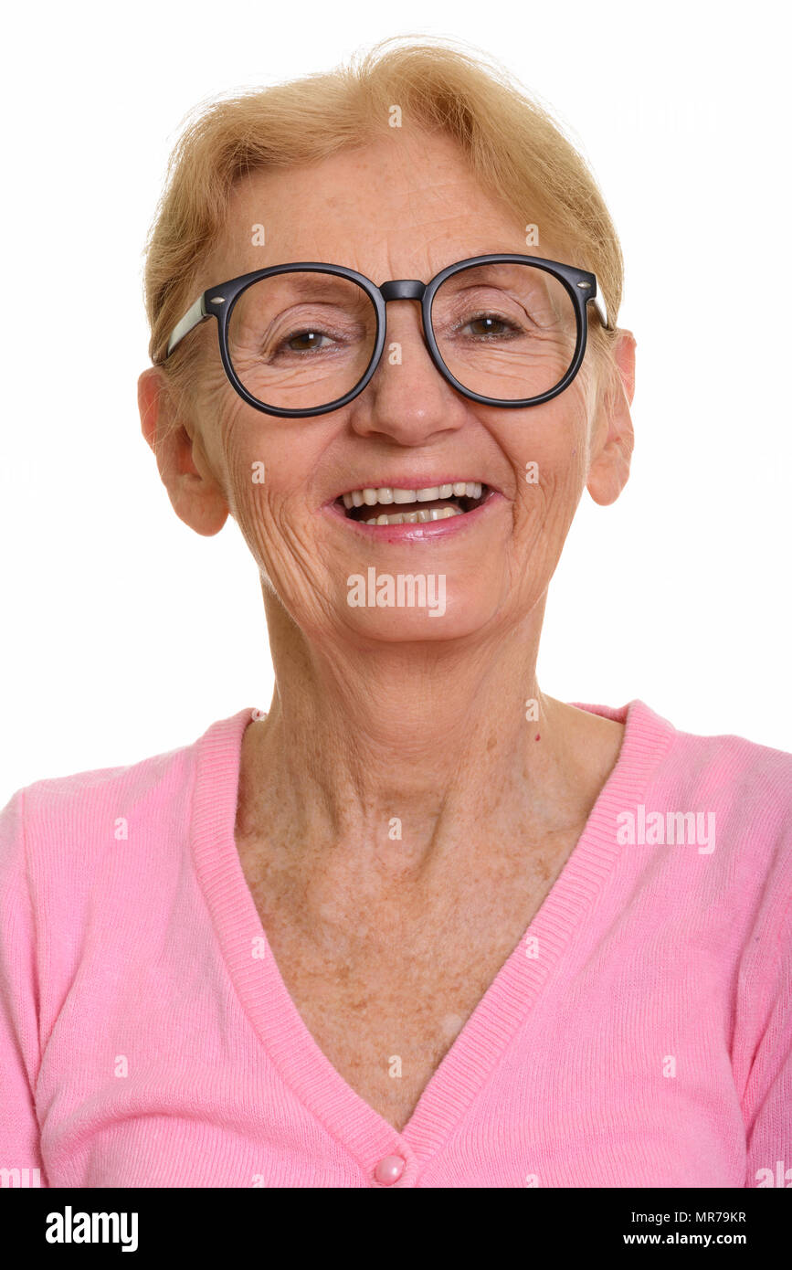 Angesichts der Happy senior Nerd lächelnde Frau beim Tragen von geeky eyeg Stockfoto