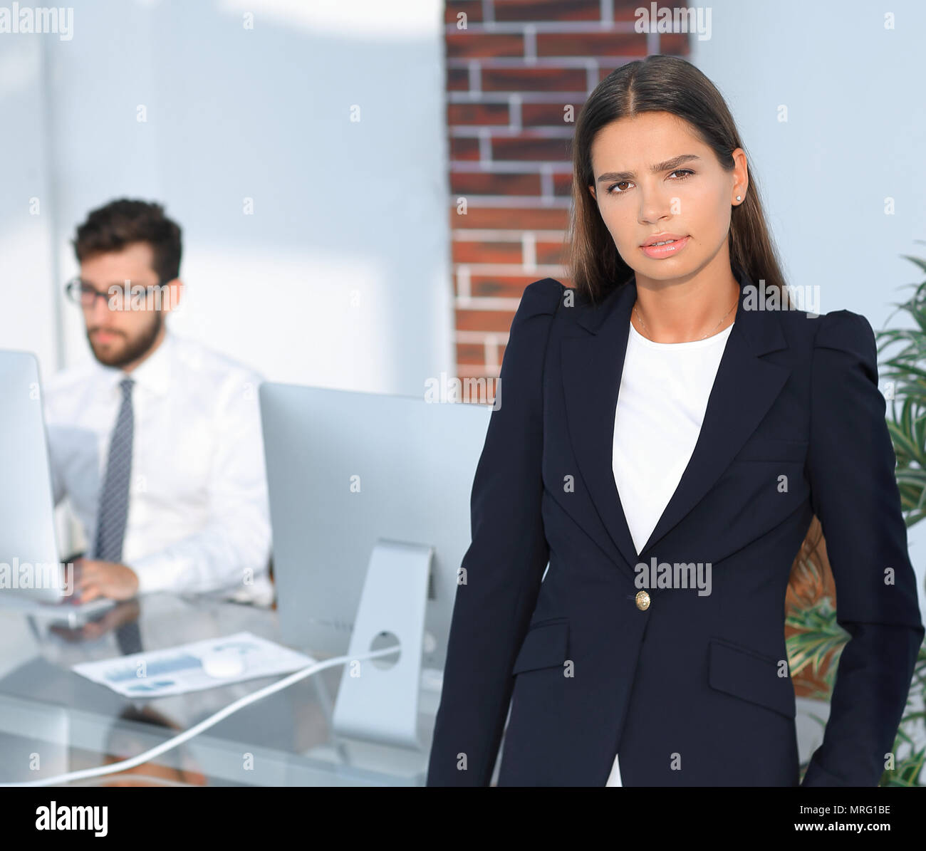 Weibliche Manager am Arbeitsplatz Stockfoto