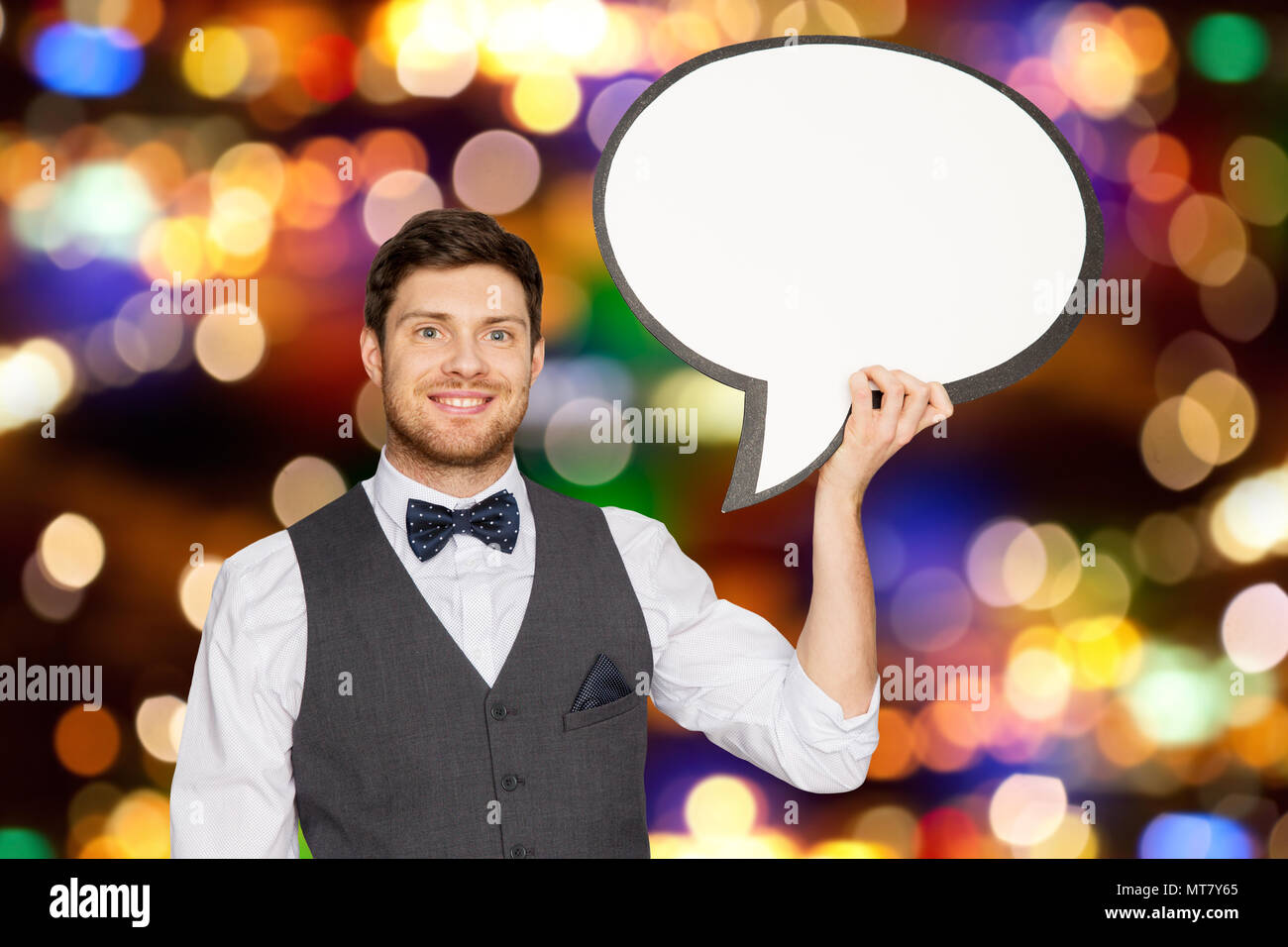 Mann mit leeren Text blase Banner über Leds Stockfoto