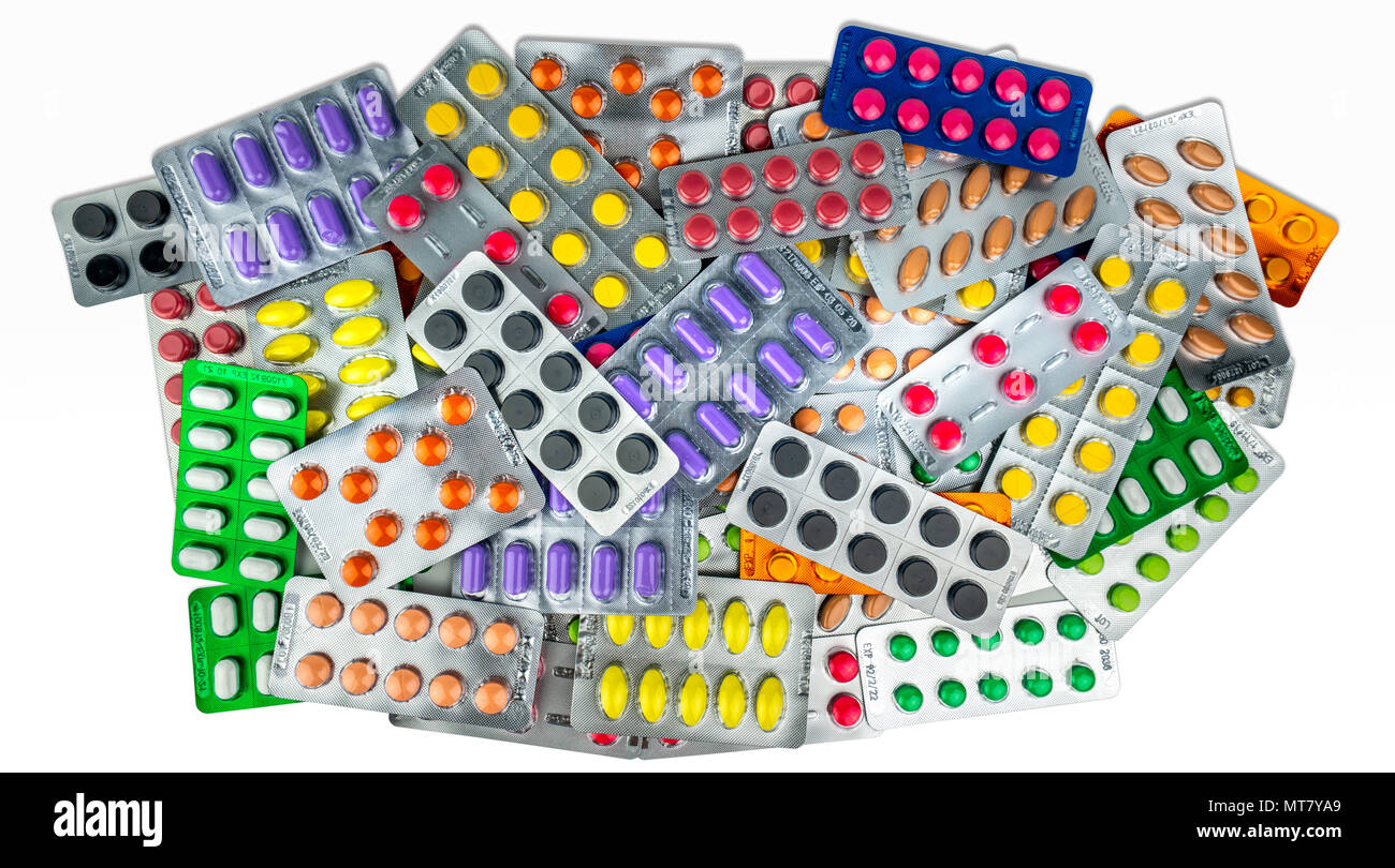Viele tabletten Pillen auf weißem Hintergrund. Gelb, Lila, Schwarz, Orange, Pink, Grün tablet Pillen in Blisterverpackung. Schmerzmittel Medizin. Droge Stockfoto