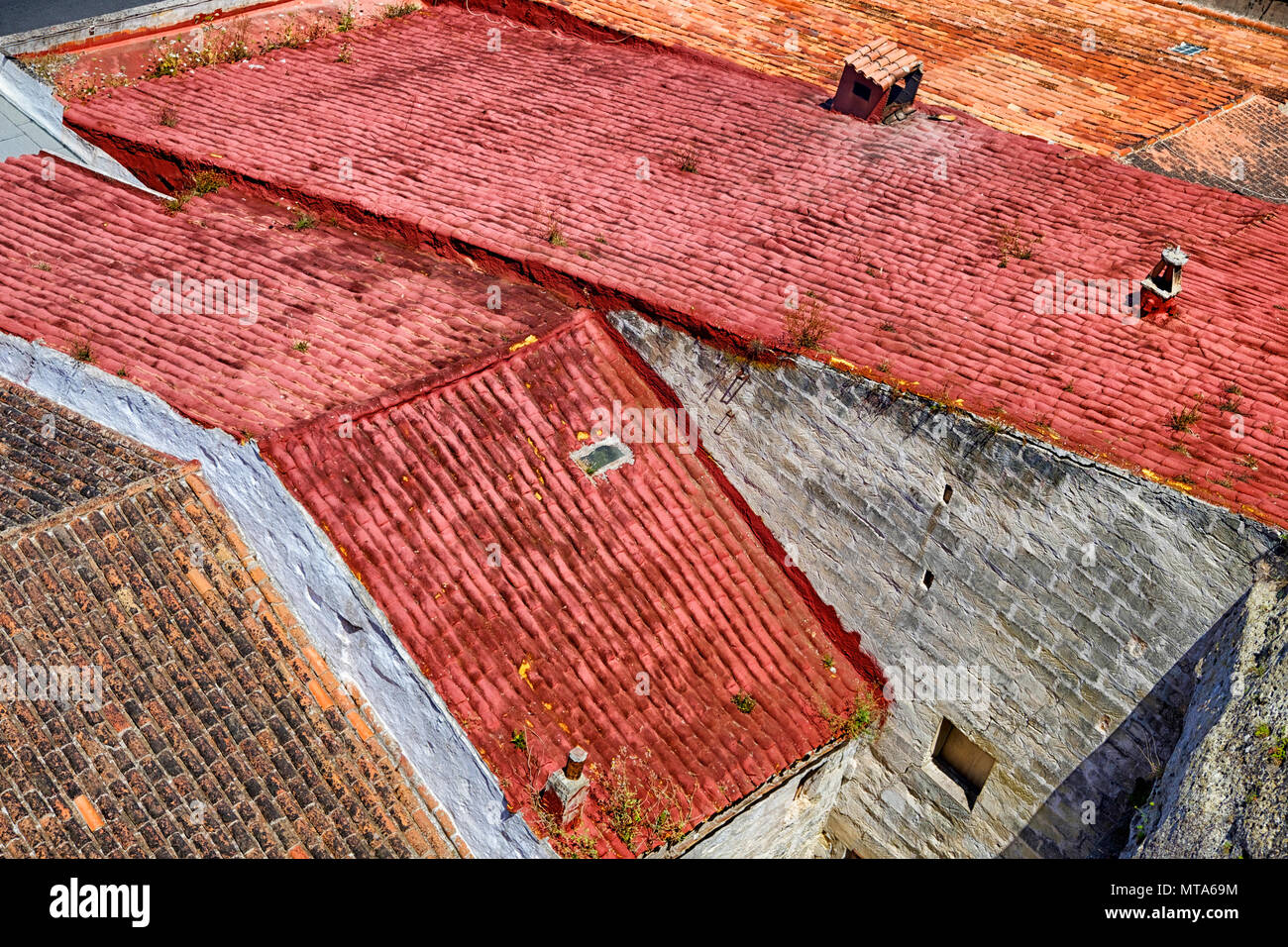 Auf farbenfrohe abstrakte Muster von Terracotta Dachziegel von Gebäuden in Porto Mahon Menorca Spanien Stockfoto