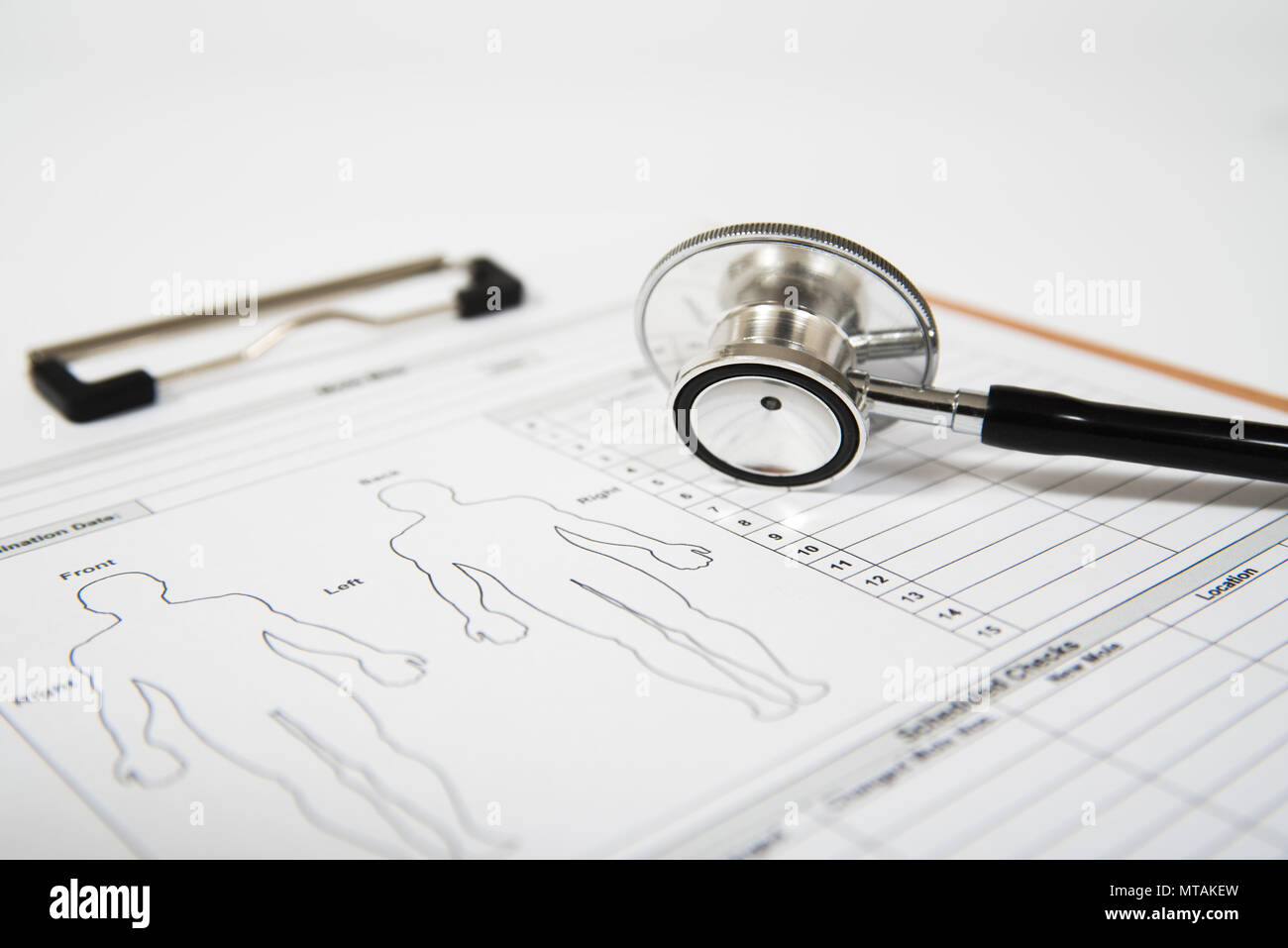 Stethoskop auf einer medizinischen Form. Healthcare Konzept Stockfoto