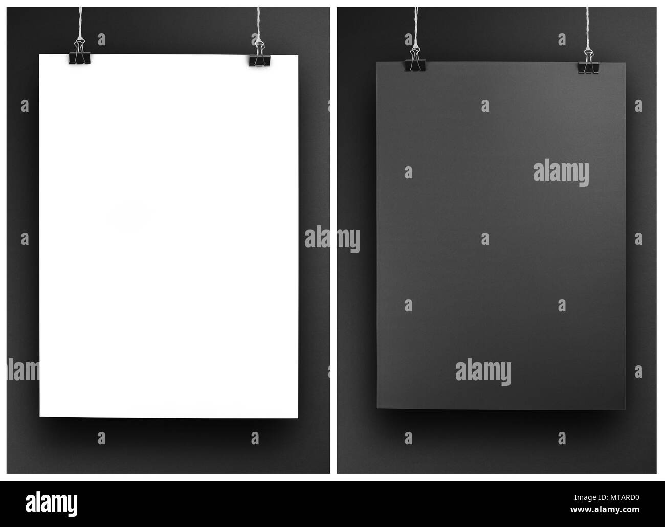 Schwarz-weiss Poster auf einem Seil. Blatt Papier hängt an zwei schwarze binder clips Stockfoto
