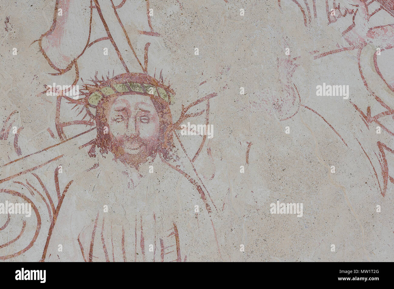 Christus am Kreuz, trug eine Dornenkrone, eine alte gotische Fresko in Bronnestad Kirche, Schweden, 11. Mai 2018 Stockfoto