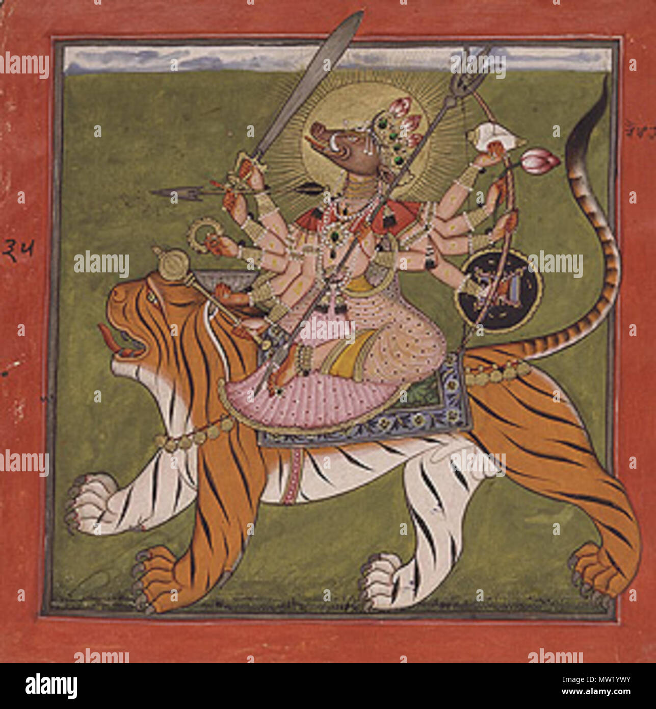 . Englisch: Varahi sitzt auf einem Tiger. Folio 35 von der Tantrischen Devi-Serie. Indien, Punjab Hügel, Basohli, Ca. 1660-70. Opak Aquarell, Gold und Käfer-wing Fällen auf Papier. ca. 1660-70.. Unbekannt 626 Varahi auf Tiger Stockfoto